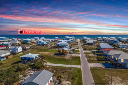 Your sunset view comes with the whole vibrant neighborhood right at your doorstep—colorful buildings, salty air, and that golden hour magic every single evening.