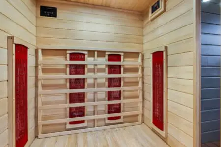 These built-in cubbies with their bright red doors are basically the organizational dream that makes you wonder why every cabin doesn't have this level of genius storage.