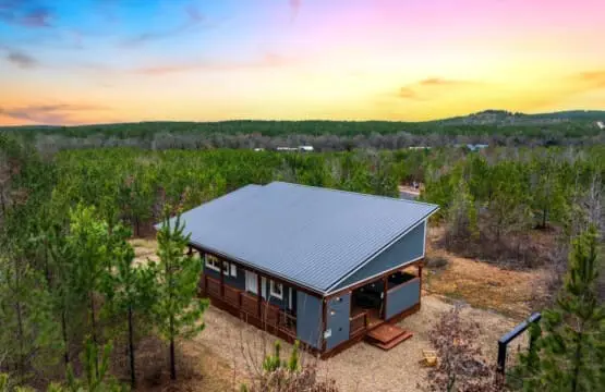 Nestled in a forest so thick and quiet you'd swear you're the only people for miles, this cabin looks exactly like the sanctuary you didn't know you were searching for.