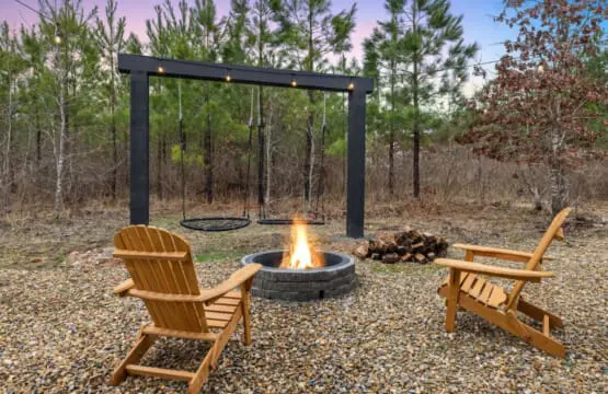 Get those swings moving as the fire pit crackles below and the forest goes quiet around you—this is the kind of simple, perfect evening that stays with you long after you leave.