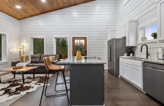 The kitchen flows seamlessly into the living space, so you can whip up breakfast while someone else is stoking the fireplace and everyone's already laughing before the coffee even brews.