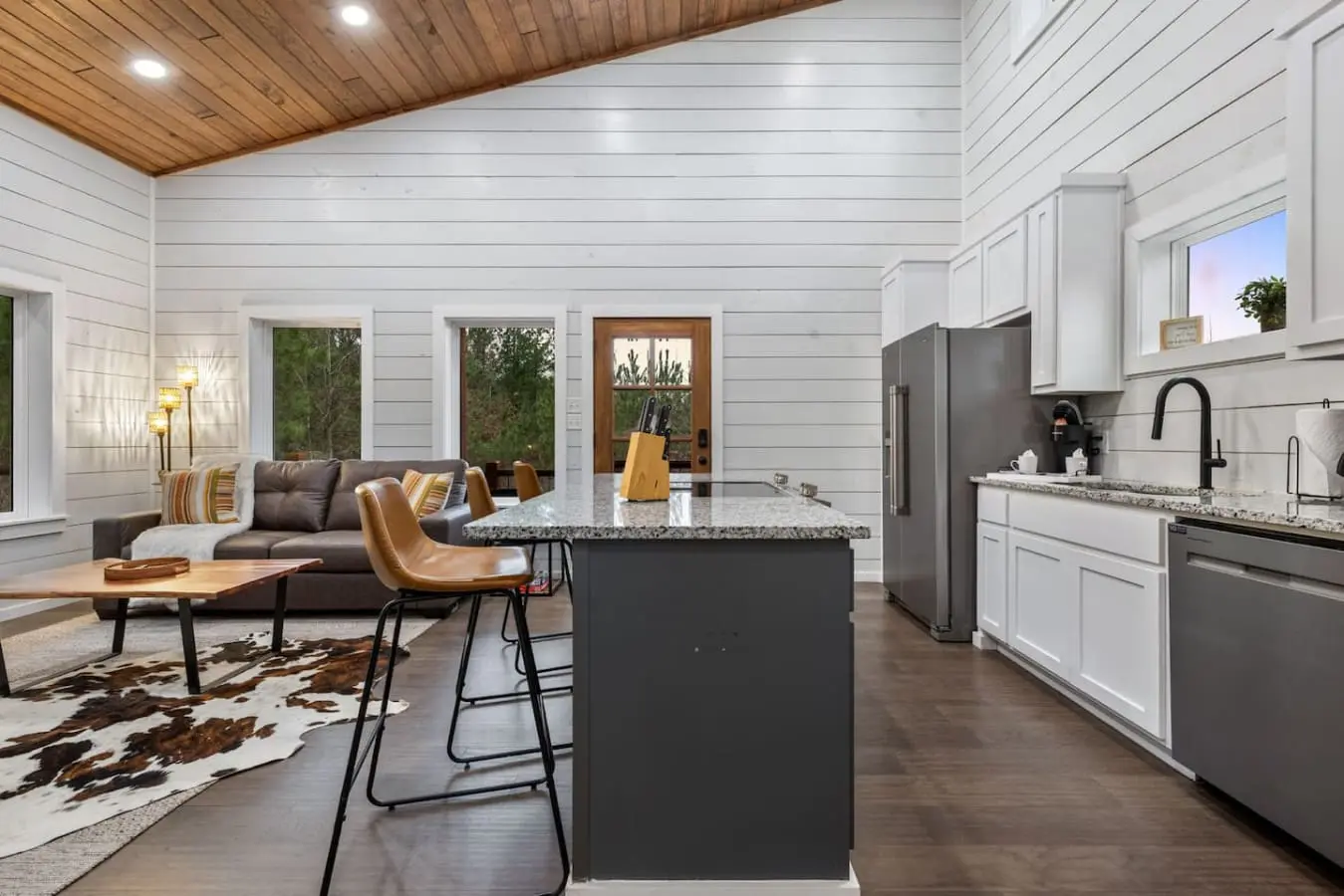 The kitchen flows seamlessly into the living space, so you can whip up breakfast while someone else is stoking the fireplace and everyone's already laughing before the coffee even brews.