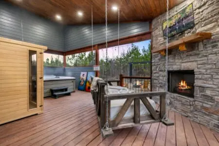 There's something about gathering on a covered porch with a fireplace crackling beside you and the forest stretching out in every direction that makes you realize you've found exactly what you were looking for.