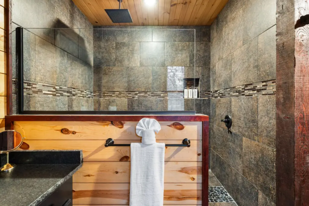 The overall design blends rustic charm with luxury elements.