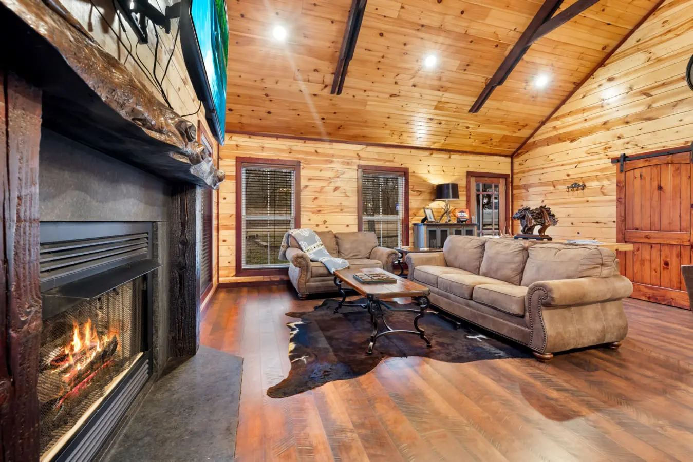 The cabin is designed to blend modern comforts with a serene, natural setting.