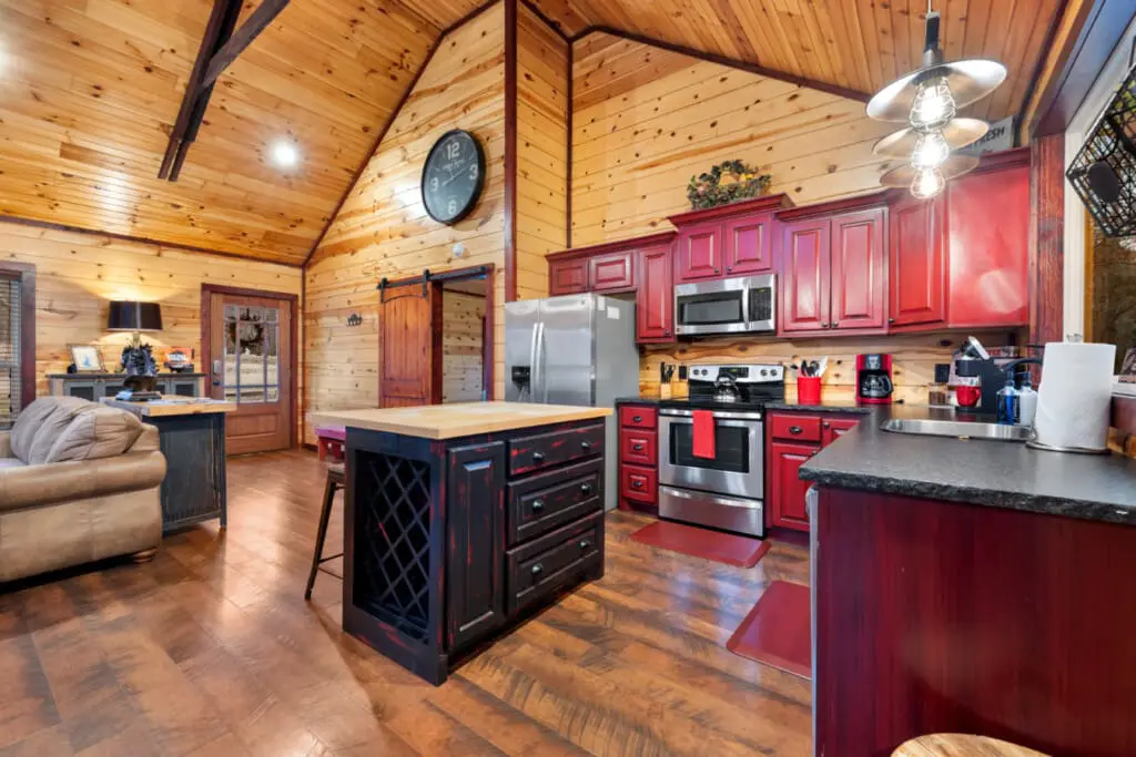 The cabin is designed as a romantic retreat with modern comforts and rustic charm.