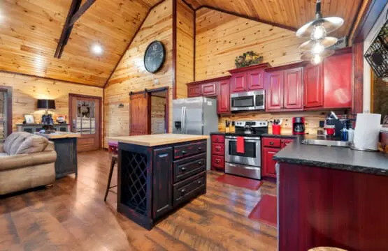The cabin is designed as a romantic retreat with modern comforts and rustic charm.