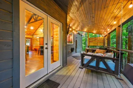 Relax on the cozy swing sofa, the perfect spot to sway gently while enjoying the peaceful outdoor atmosphere