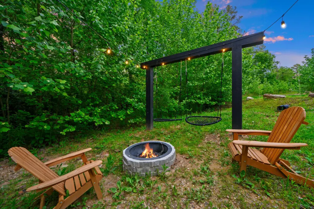 Gather around the firepit for warmth, memories, and the perfect evening under the stars