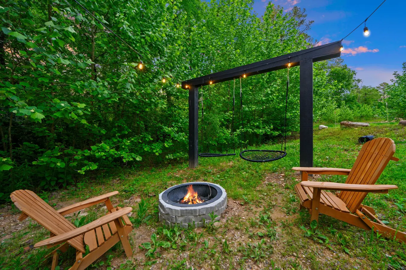 Gather around the firepit for warmth, memories, and the perfect evening under the stars