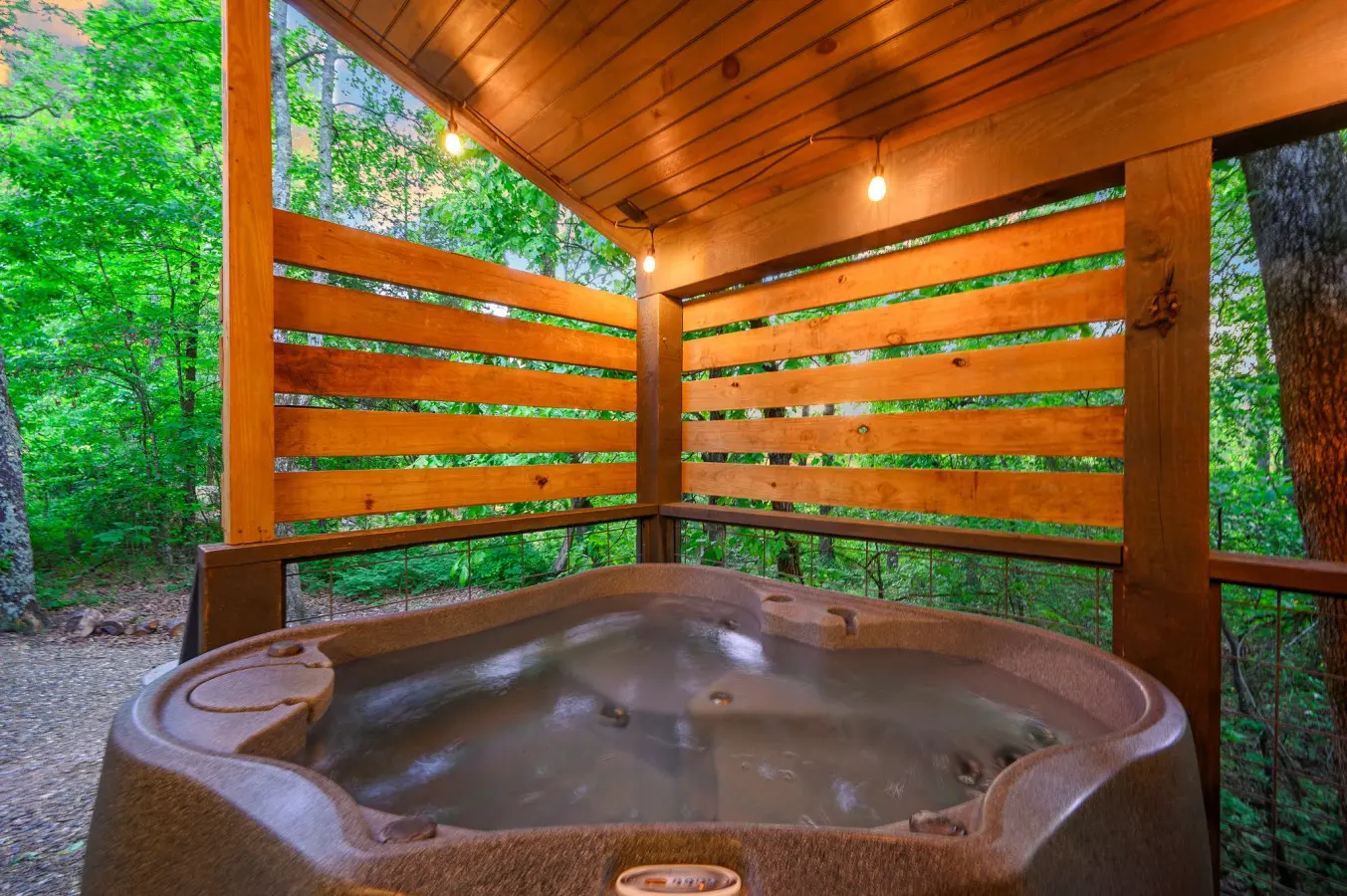 Relax and unwind in the private hot tub, the perfect spot to soak away the stress of the day