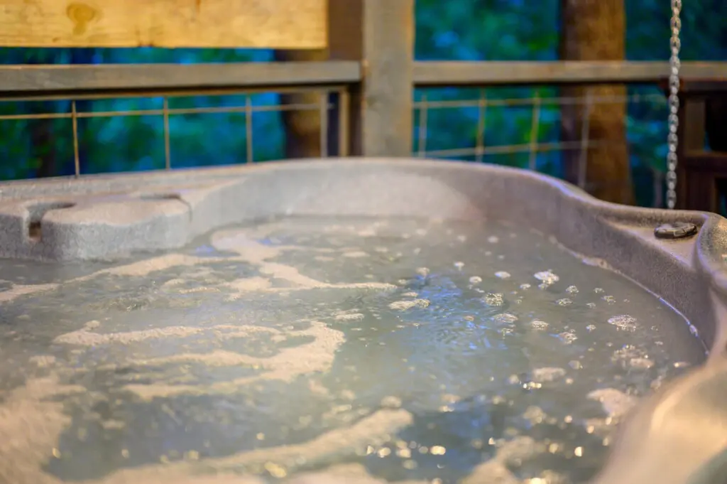 Soak away your stress and enjoy the ultimate relaxation in the hot tub surrounded by nature and comfort