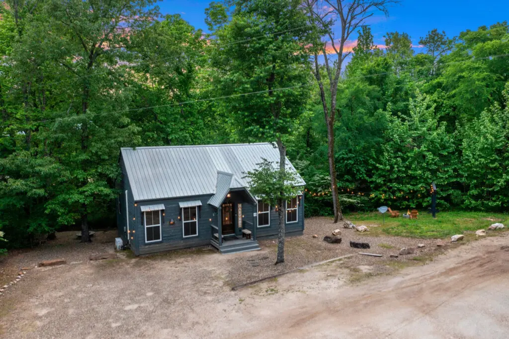 Welcome to your cozy escape, featuring the charming front view of the cabin inviting you to relax and unwind