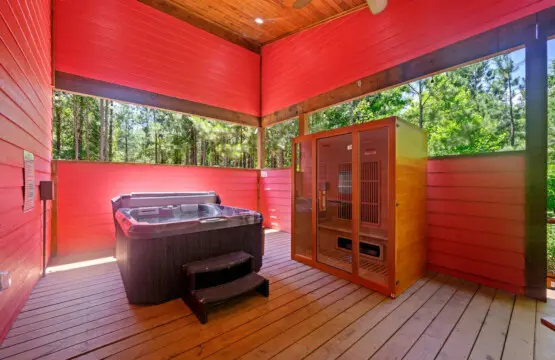 Slip into the sauna, soak in the hot tub, and let the forest views and that vibrant red ceiling basically convince you that you've found your own personal wellness retreat.