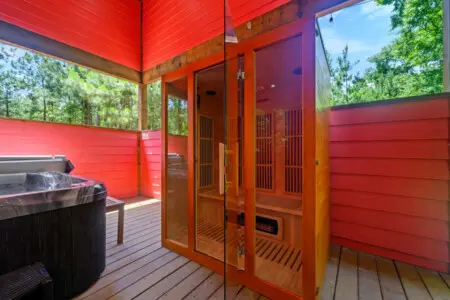 Nothing beats stepping out of the sauna into the crisp forest air, especially when you've got your own private spa setup right on the deck.