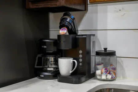 Grab your favorite mug and settle in—whether you're a single-cup K-cup person or a full-pot coffee drinker, this setup's got you covered for every morning of your stay.