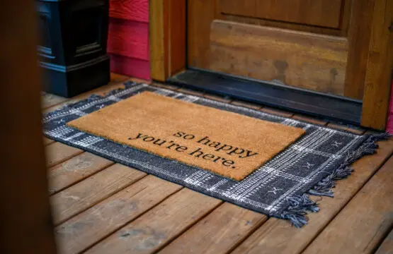 Welcome to Lil Red—the doormat pretty much says it all, because the second you step inside, you're genuinely going to be happy you're here.