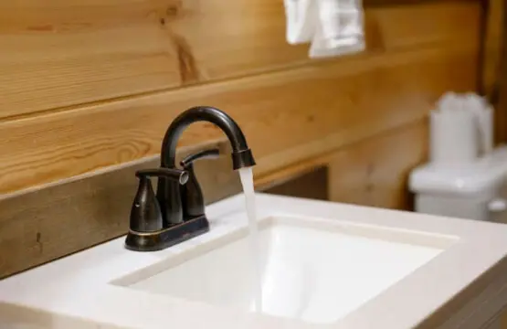 Nothing about this image warrants a caption for a luxury vacation rental, as it shows a standard bathroom sink with no distinctive features, views, or luxury amenities visible.