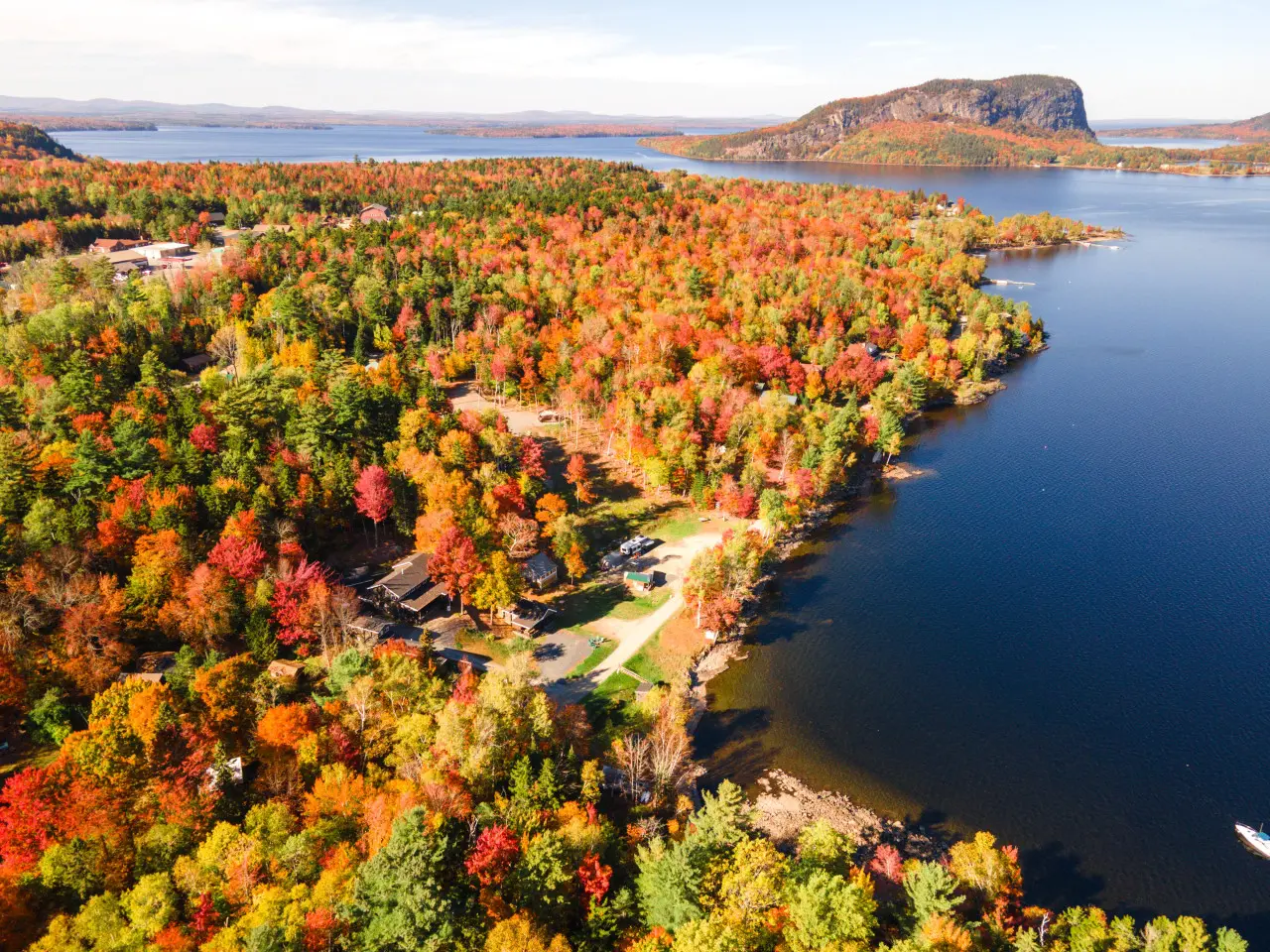 A patchwork of fall colors wrapped around the lake.