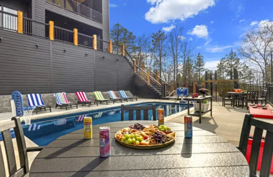 Colorful loungers lined up poolside — this is peak afternoon at Eagle's Vista.