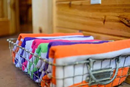 Fresh, colorful linens ready for your stay in our cozy home.