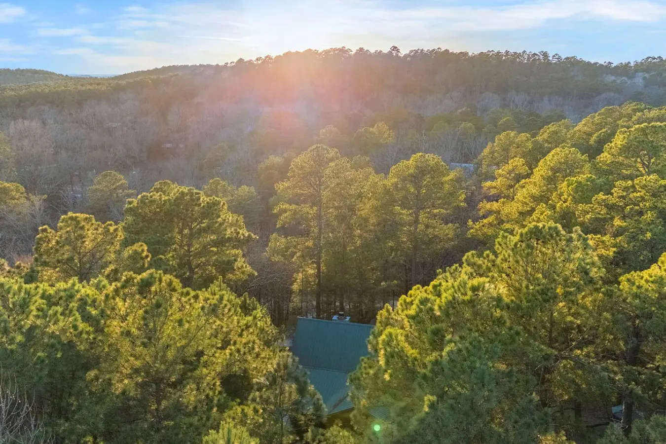 Wake up to views of pristine forest and water that stretch for miles from your private retreat.