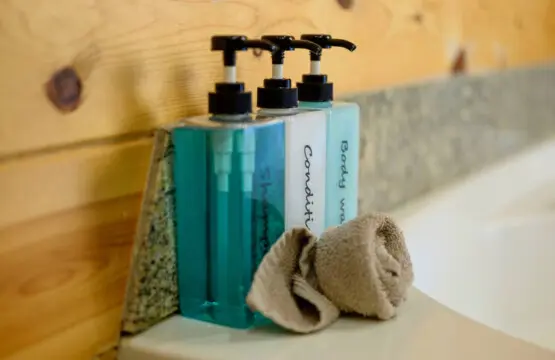 Spa-quality toiletries and plush towels ready for you in the beautifully tiled bathroom.
