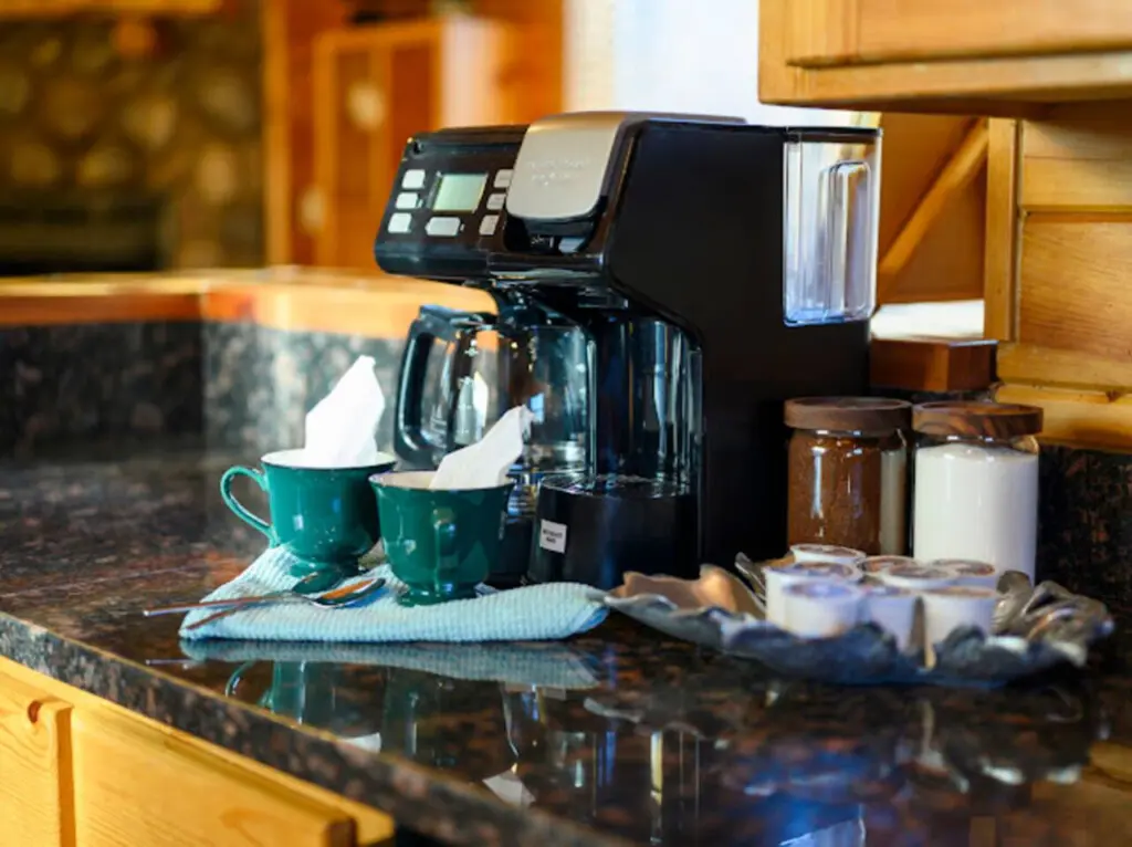 Your morning coffee station is perfectly positioned on the granite counter with a view of the kitchen.