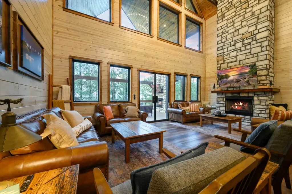This spacious wood-and-stone lodge has tons of natural light, a cozy fireplace, and comfy seating perfect for hanging out with a group.