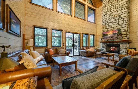 This spacious wood-and-stone lodge has tons of natural light, a cozy fireplace, and comfy seating perfect for hanging out with a group.
