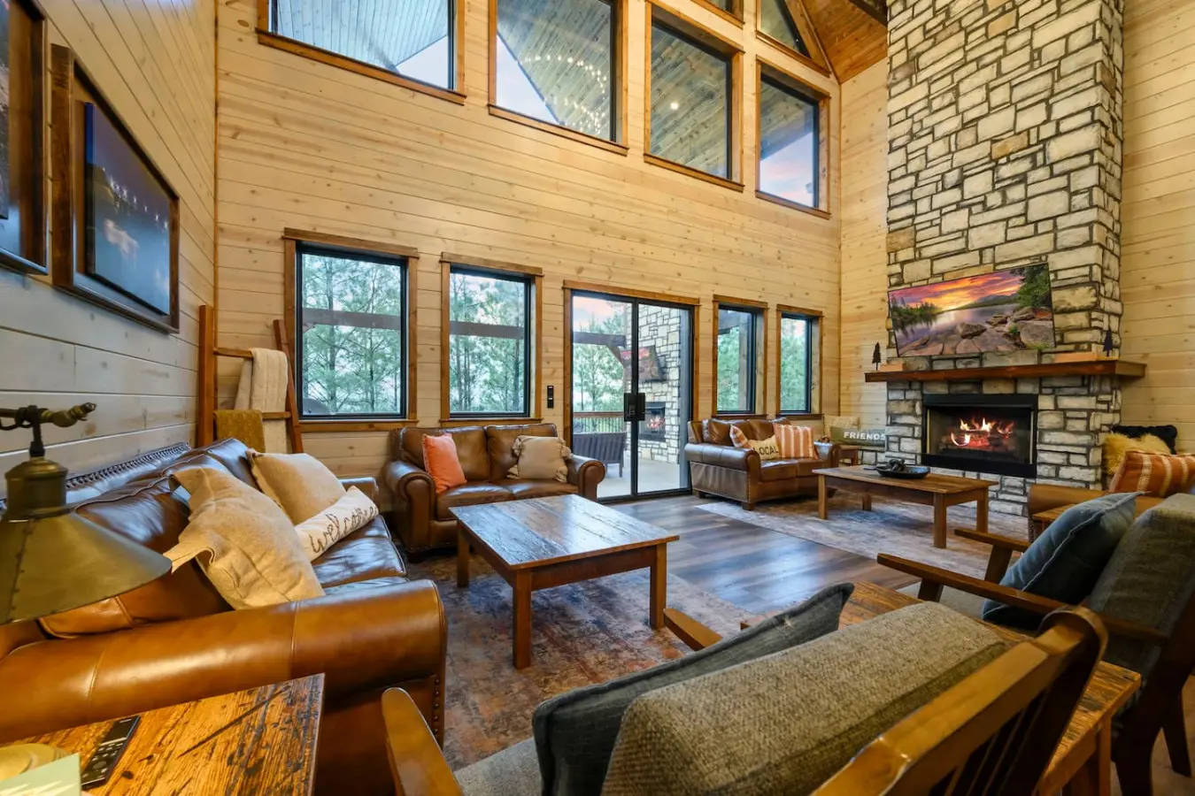 This spacious wood-and-stone lodge has tons of natural light, a cozy fireplace, and comfy seating perfect for hanging out with a group.