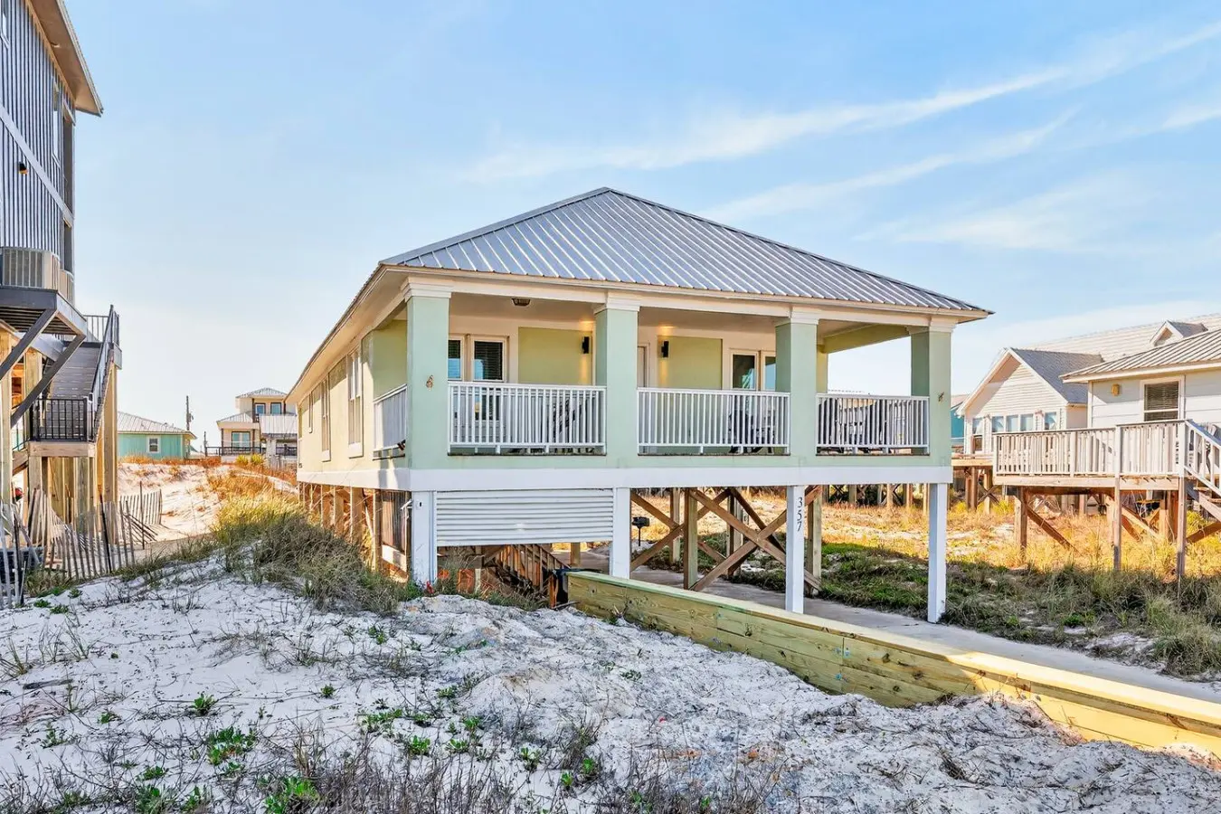 This charming beachfront retreat sits perfectly perched above the sand, offering direct access to the shore and those unforgettable coastal sunsets you've been dreaming about.