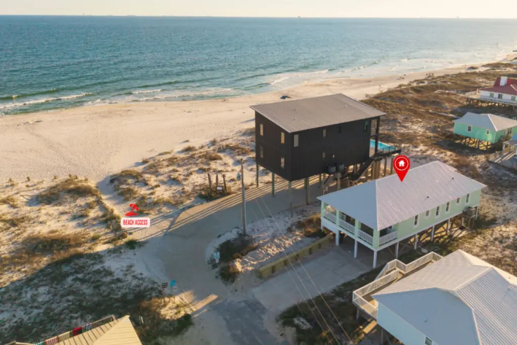 Picture yourself lounging on those elevated decks with nothing but sand, sea, and sky stretching out in front of you—this is the beachfront home where you can actually live out those coastal dreams you've been daydreaming about.