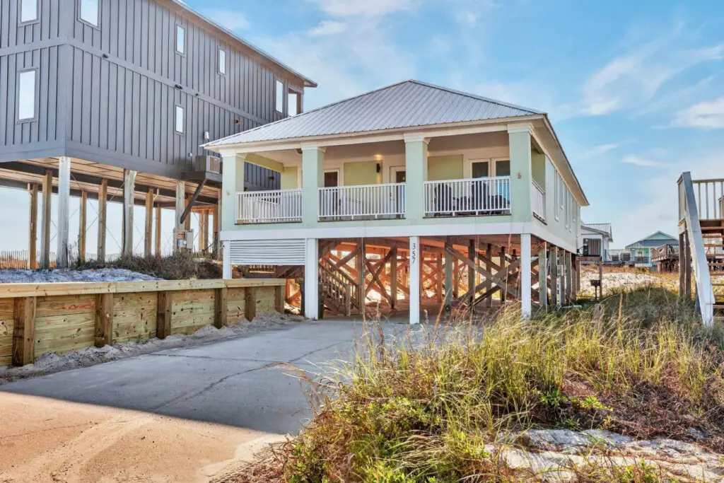 Wake up to ocean views, fall asleep to the sound of waves, and spend your days in this spacious beachfront home that feels like a slice of coastal paradise.