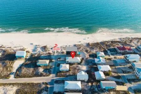 Perched perfectly above the sand in this charming beach community, you've got direct access to the shore, unbeatable ocean views, and that laid-back coastal vibe that makes you never want to leave.