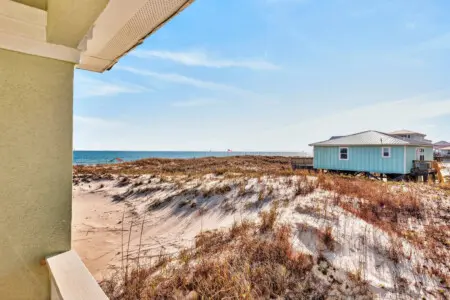 Perched right on the dunes with unobstructed ocean views and sand between your toes in seconds, this is the beachfront getaway you've been waiting for.