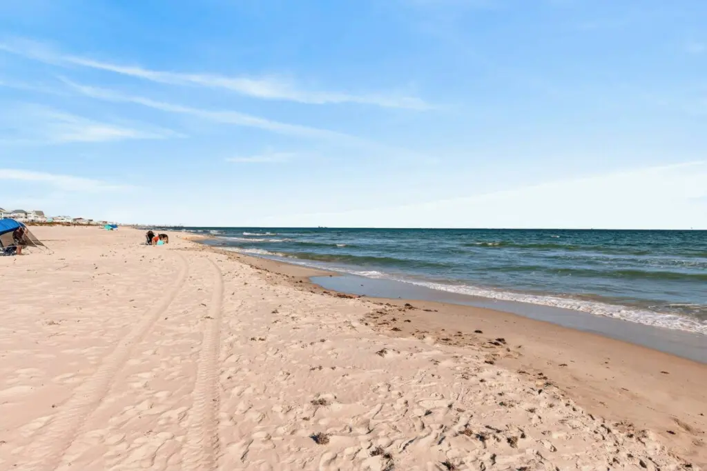 Stroll along the shoreline right from your doorstep—this is the kind of beachfront living where the sand, sea, and sky become your everyday view.