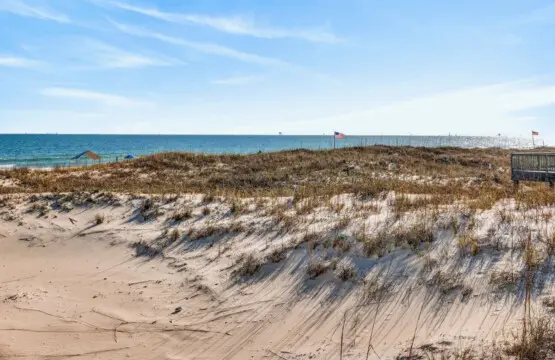 This is the kind of beachfront spot where you can literally roll out of bed and onto the sand—dunes, sea grass, and that endless ocean view all part of your daily backdrop.