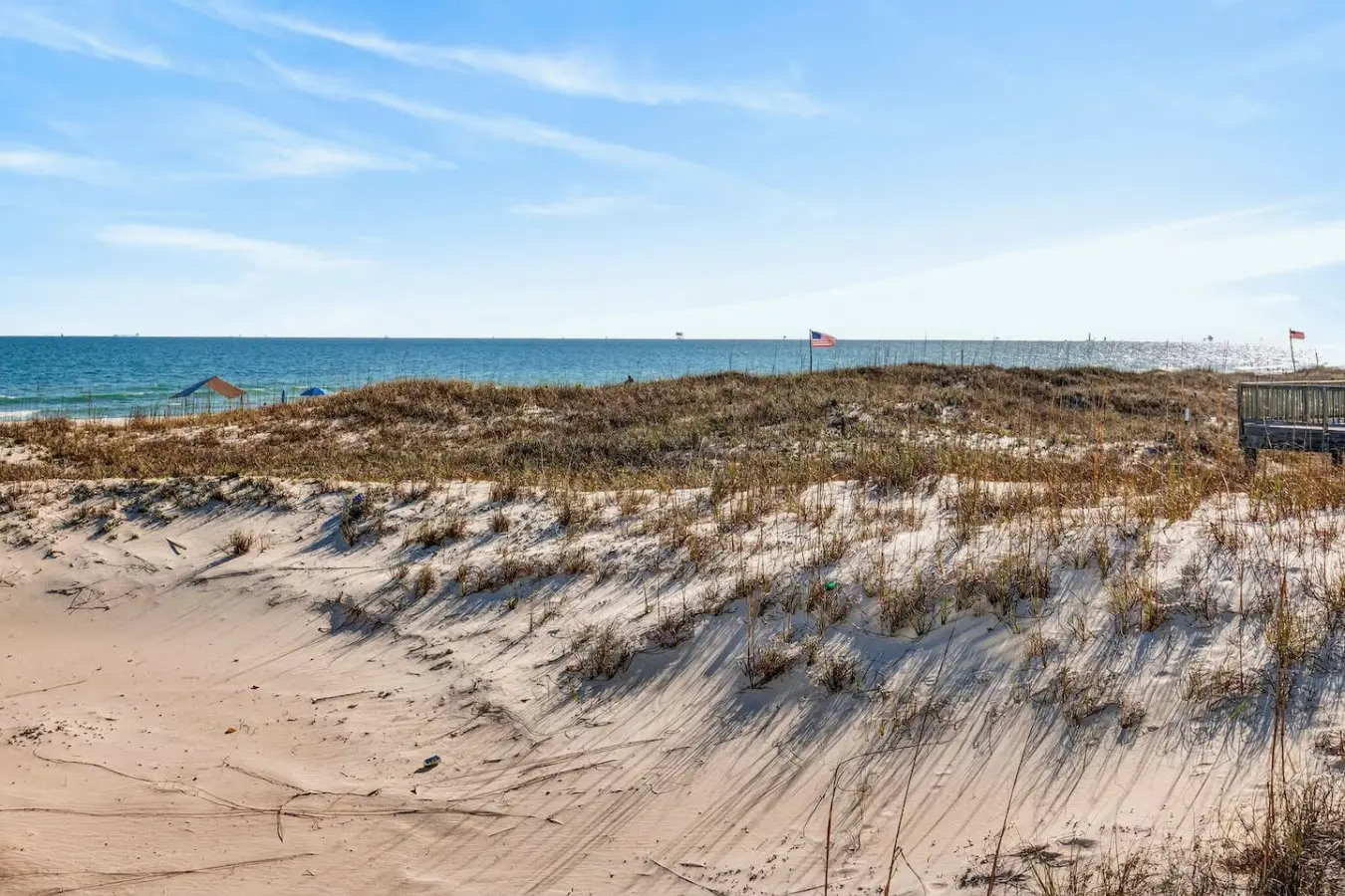 This is the kind of beachfront spot where you can literally roll out of bed and onto the sand—dunes, sea grass, and that endless ocean view all part of your daily backdrop.