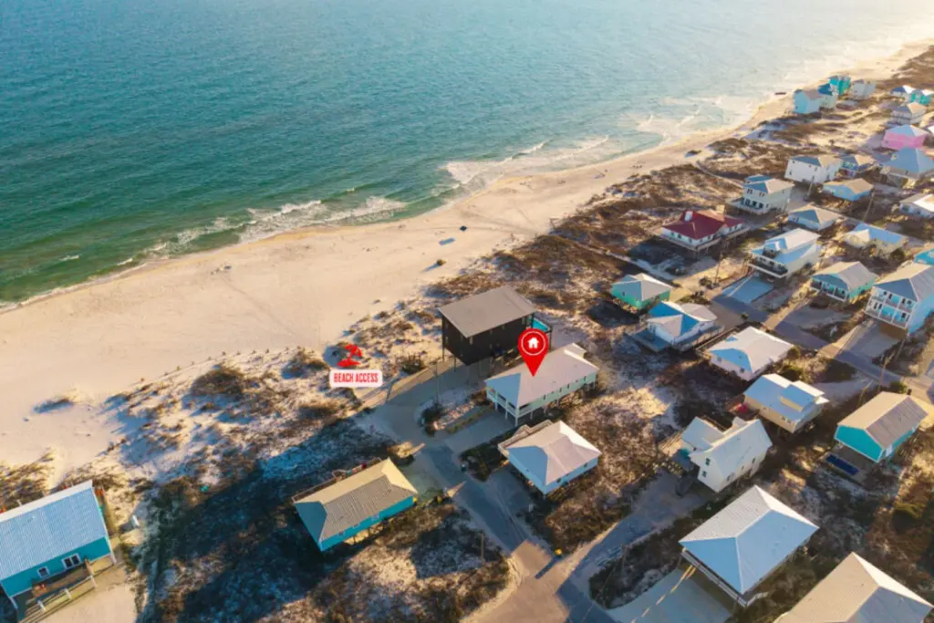 Nestled in a charming beach community with direct sand access and endless ocean views, this elevated beachfront home is basically your front-row seat to the perfect coastal escape.