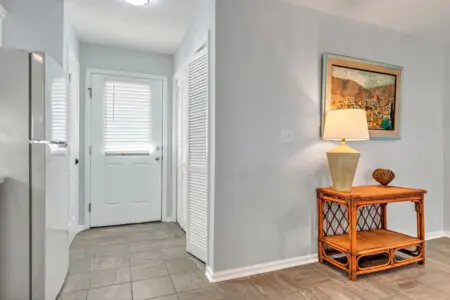 This bright, welcoming entryway sets the perfect tone for your stay—complete with easy beach access, smart storage solutions, and that breezy coastal vibe that makes you feel like you're already on vacation the moment you walk in.