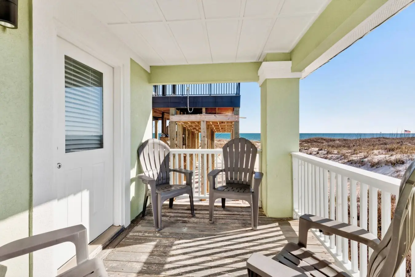 Settle into those Adirondack chairs on your private deck and let the sound of the waves do all the talking—this is the kind of beachfront view that makes you forget what day it is.
