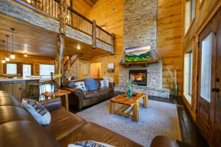 Where comfort meets forest views — Treetop living room