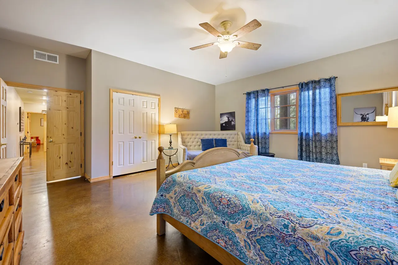 Step into our cabin bedroom and experience the luxury of space, where ample room surrounds you, inviting you to stretch out and unwind in comfort.