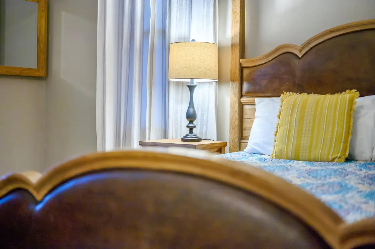 This bedroom is a sanctuary of tranquility, where every detail is curated for comfort and relaxation, ensuring peaceful nights and rejuvenating mornings.