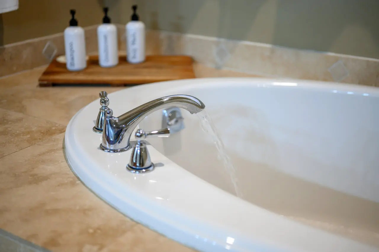 The tub beckons, offering a luxurious escape from the world outside, where every soak becomes a moment of pure relaxation and rejuvenation.