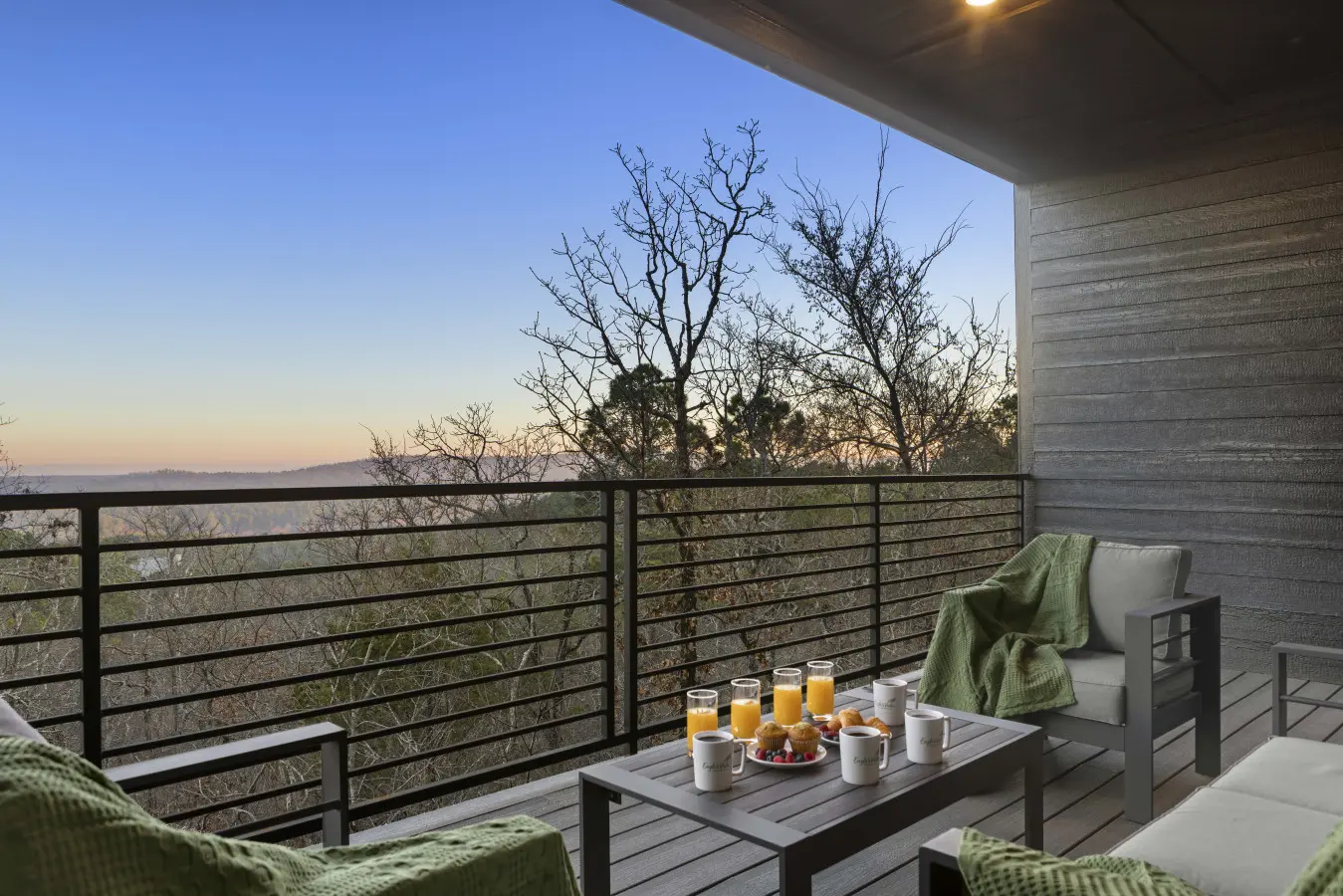 Deck views while the sun comes up over the Broken Bow trees — not a bad way to start the day.