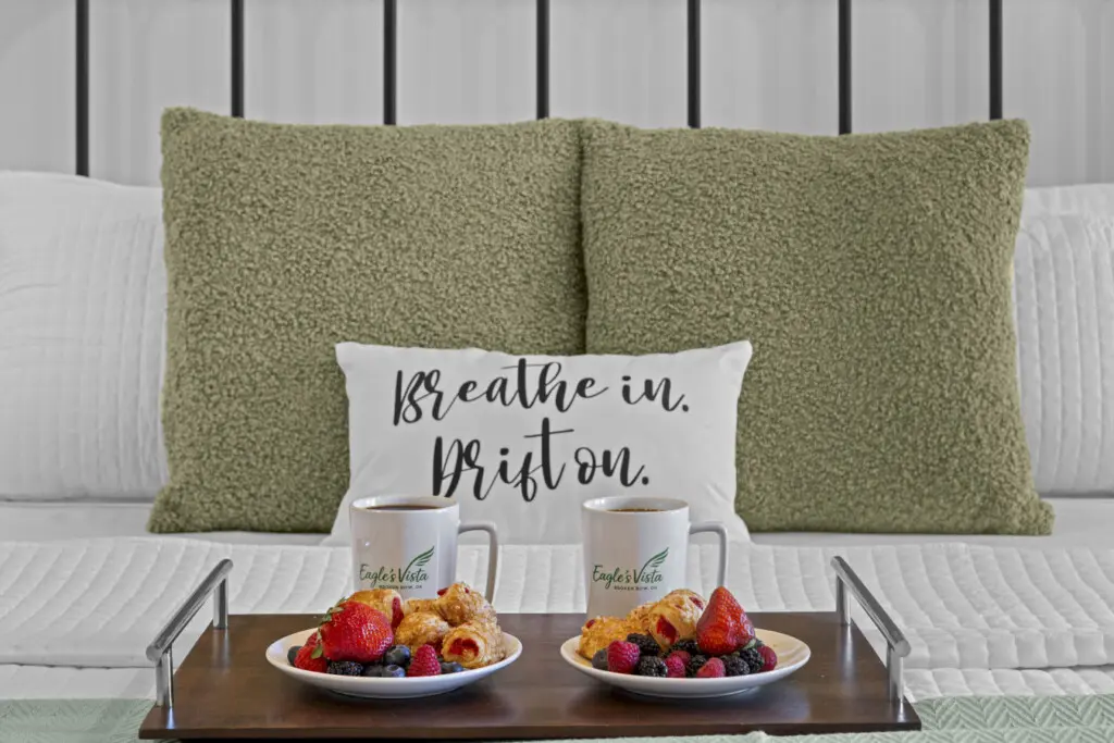 Slow mornings start here — two of everything and those Eagle's Vista mugs front and center.