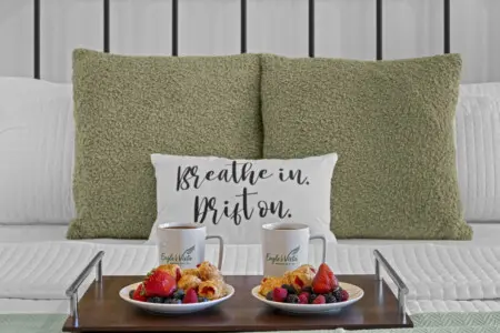 Slow mornings start here — two of everything and those Eagle's Vista mugs front and center.