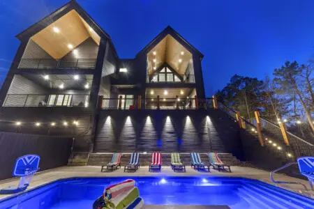 Watch the sun set over your private pool at this stunning modern estate with resort-style amenities.